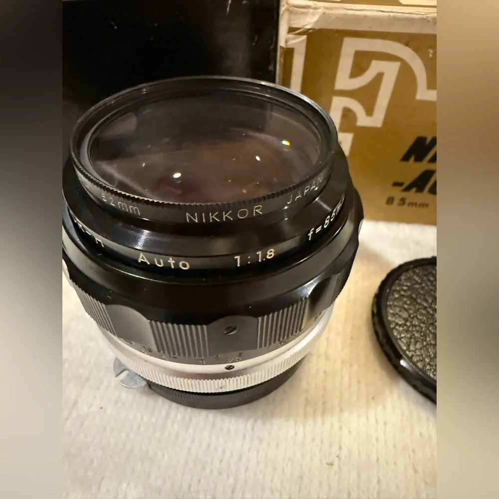 Classic Nikon 85mm F1.8 Non AI Nikkor aka “The portrait lens” w/leather case